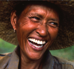 A Filipino woman in a straw hat